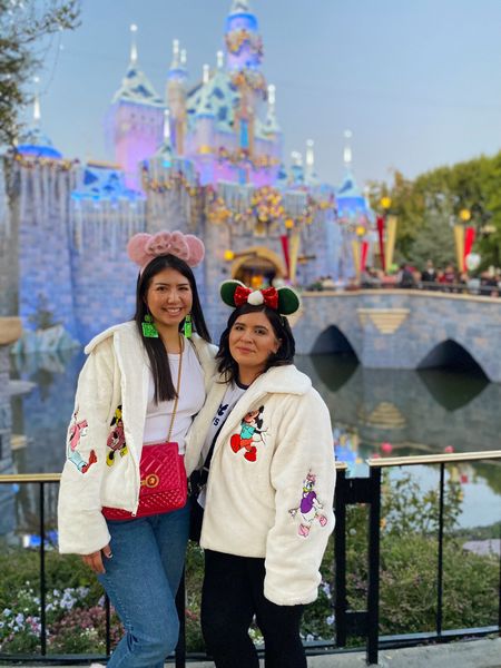 Matching jackets at Disneyland with my cousin! #disneyadult #disney #disneyland #disneyputfit #disneyjacket #disneycoat #shopdisney #minnieears #encanto #cozyjacket #fluffycoat 

#LTKSeasonal #LTKunder100 #LTKHoliday