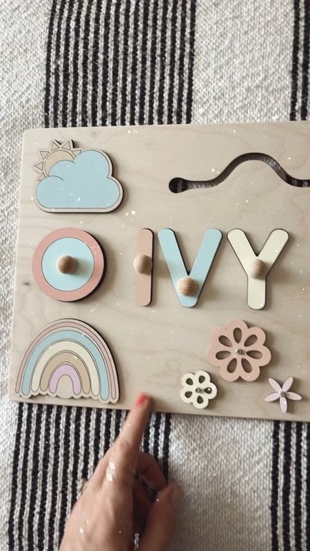 Beautifully handcrafted wooden puzzle busy board for baby 🧡 Lots of color and personalization options ! Order now for Christmas delivery 🎄

#LTKHoliday #LTKGiftGuide #LTKbaby