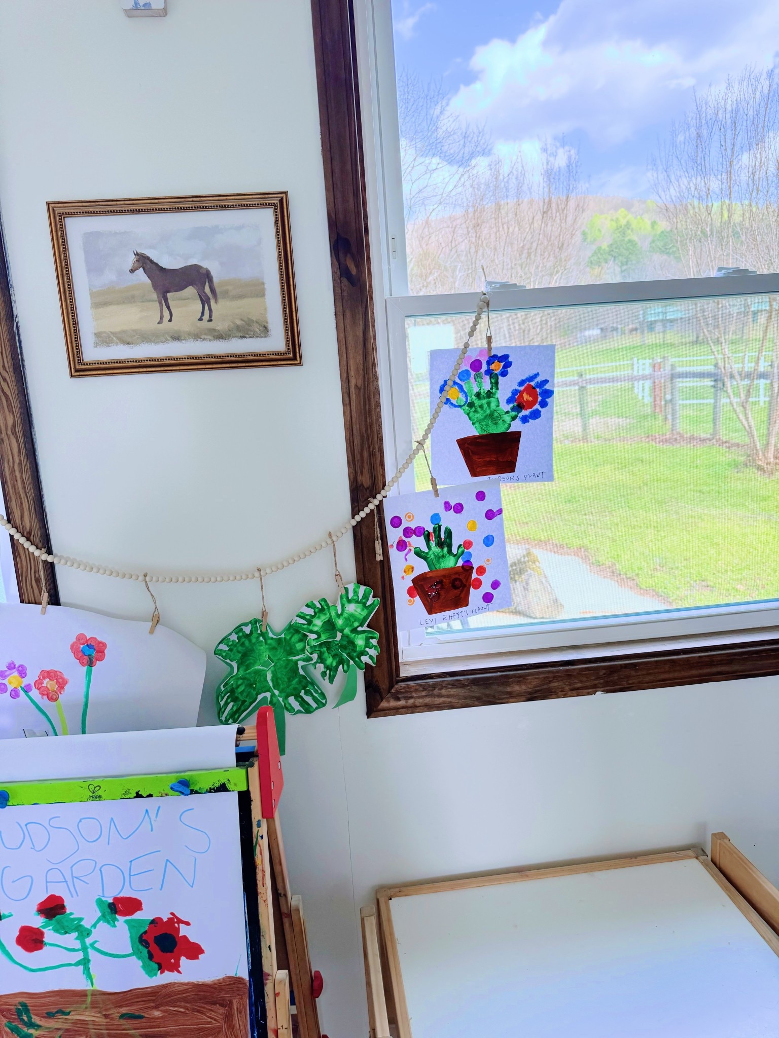 These little cuties 👶🏼🩵 loved 🥰 making their very own little handprint ✋🏽 plants 🪴 this week and they make the absolute cutest (!!) wall art 🖼️ to add to your spring decor 💐🌼 around the house! 🏡 Like I always say, the former kindergarten teacher 🍎 in me lives for these y’all!! 🤭😍 Such an easy activity to differentiate based on ages with the flowers 🪻- Judson wanted to use his paint sticks 🎨 to hand draw ✍🏼 his and Sweet Baby Levi Rhett used the little “dot dot” paints - perfect for his age!! ❤️ Linked everything we used 🔗 (and my favorite window display line!! 🪟) over on my LTKit shop 🫶🏽 - let me know if your littles make this sweet spring craft, too!! 🖌️ #springcraftidea #handprintcrafts #formerkindergartenteacher #sahm #springhandprintcraft 