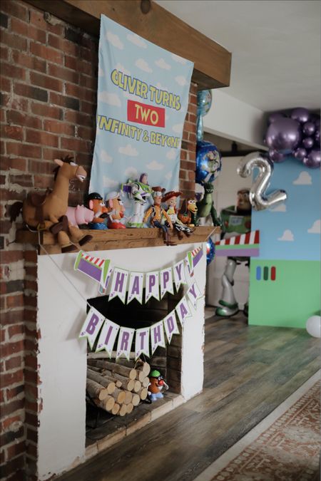 Custom banner off Etsy! This shipped super quick and is amazing quality! The banner sign hanging came in a pack (we also used the balloons, the other banner and the cake topper!) 

Buzz Lightyear, Toy Story party, Toy Story theme, buzz theme, two infinity and beyond 

#LTKkids