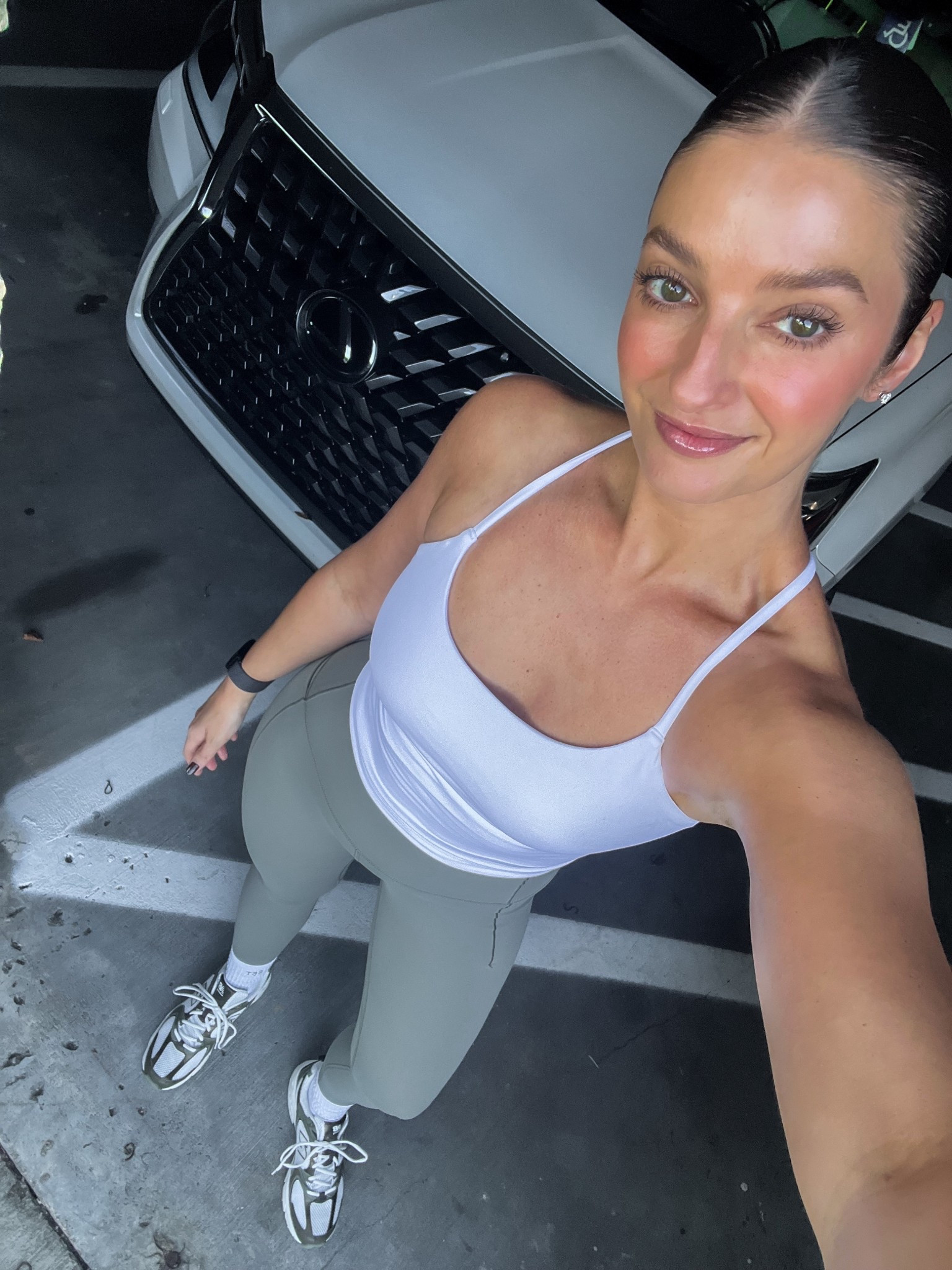 I love these t-back tanks!! Have them in black and white and they’re great quality, fit is amazing, built in bra is supportive enough to sprint in (for me). Wearing a small! 

#LTKActive #LTKFindsUnder100