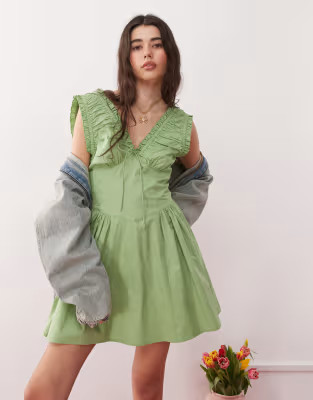 Reclaimed Vintage summer dress with ruched detailing and cinched in waist in green | ASOS (Global)
