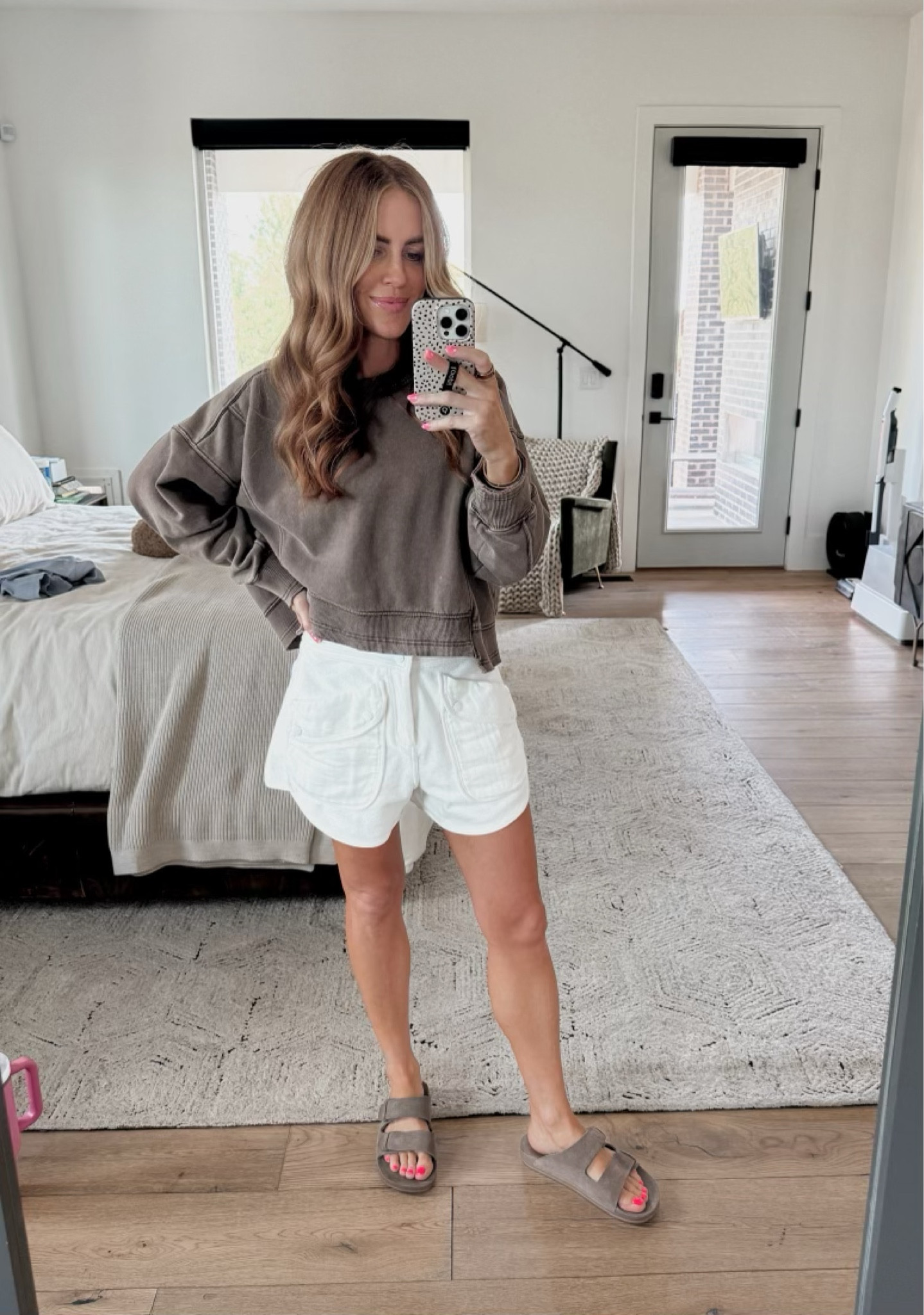 I have the pants version of these shorts and love them. They’re a terry cloth material which is great for the summer / swimming! 
Wearing and XS in the top + bottoms. The shoes are men’s and I’m in a 7 (regularly and 8 in women’s sizing) 