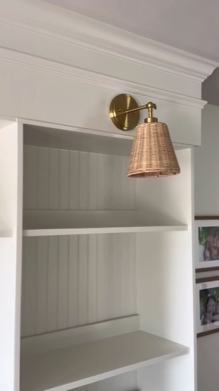We wanted custom built-ins but were quoted $14,000.

Instead, we used IKEA HAVSTA units, added trim, beadboard, the prettiest  sconces, and had them professionally painted.

4 Havsta bases and 2 Havsta bookcases. 

Total cost: $4,335.

This is how we created a custom built-in look for a fraction of the cost.

#ikea #ikeahack #builtinbookshelves #homedecor #budgethome