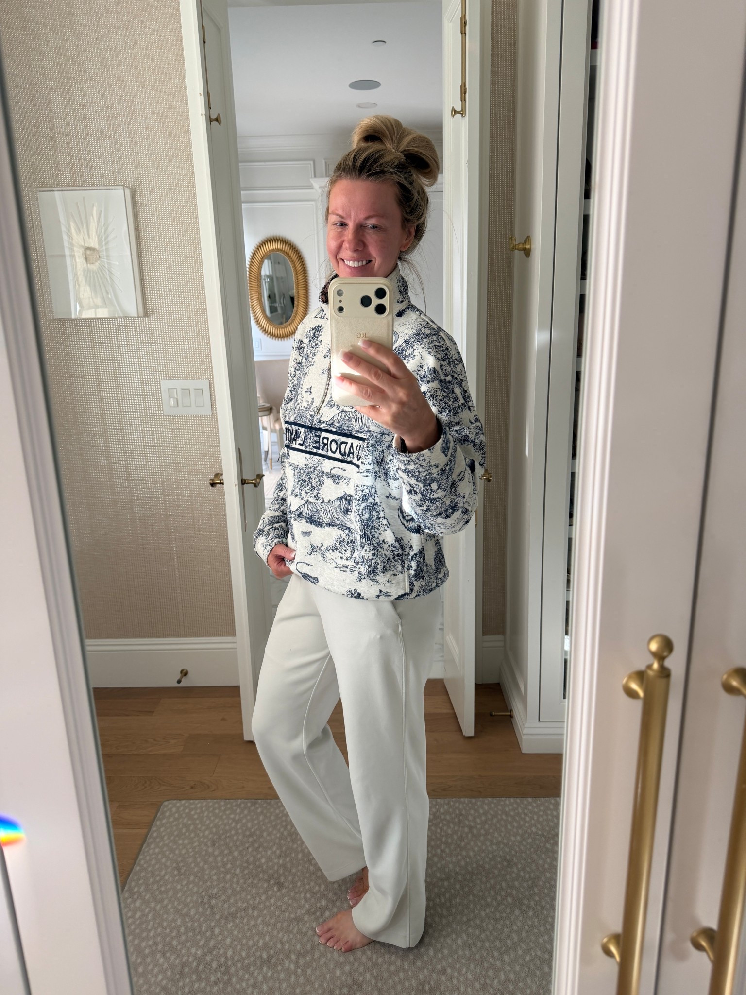 Cutest designer style sweatshirt! So comfy! Wearing a medium. 

#LTKTravel #LTKmomlife #LTKOver40