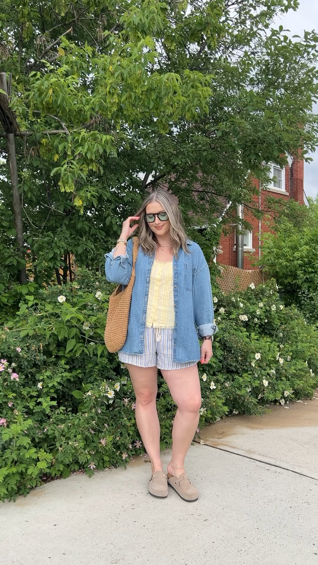 Easy summer outfit! Canadian links are under “similar products”. Wearing my usual size L in the striped shorts, butter yellow tank top, and oversized denim shirt. Straw tote bag is one of my fave Amazon finds! Linked similar clogs

#LTKsummer #LTKmidsize #LTKstyletip