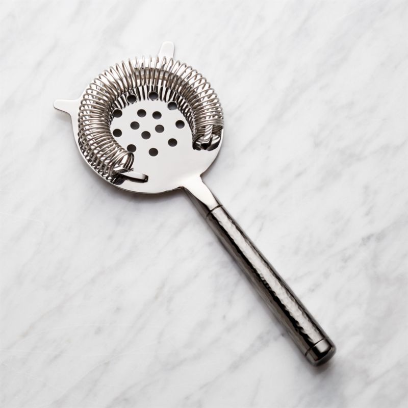 Graham Hammered Metal Springed Strainer + Reviews | Crate and Barrel | Crate & Barrel