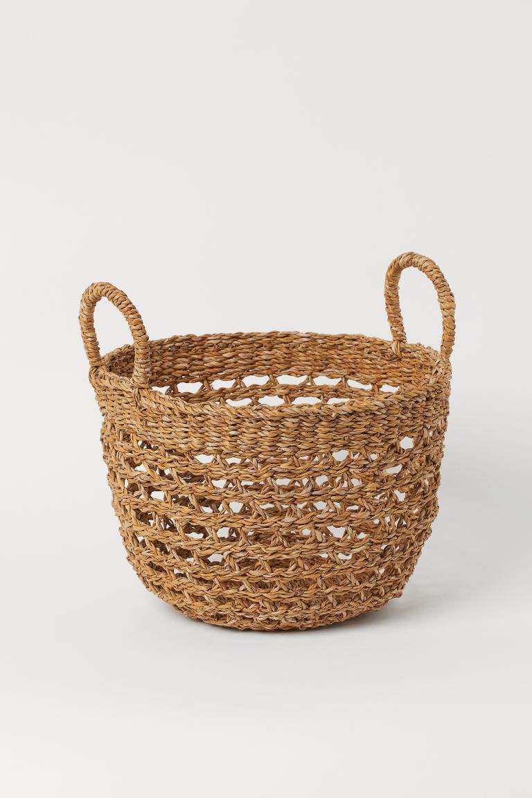 Practical storage basket in braided seagrass for a decorative touch in any room. Two handles at t... | H&M (US + CA)