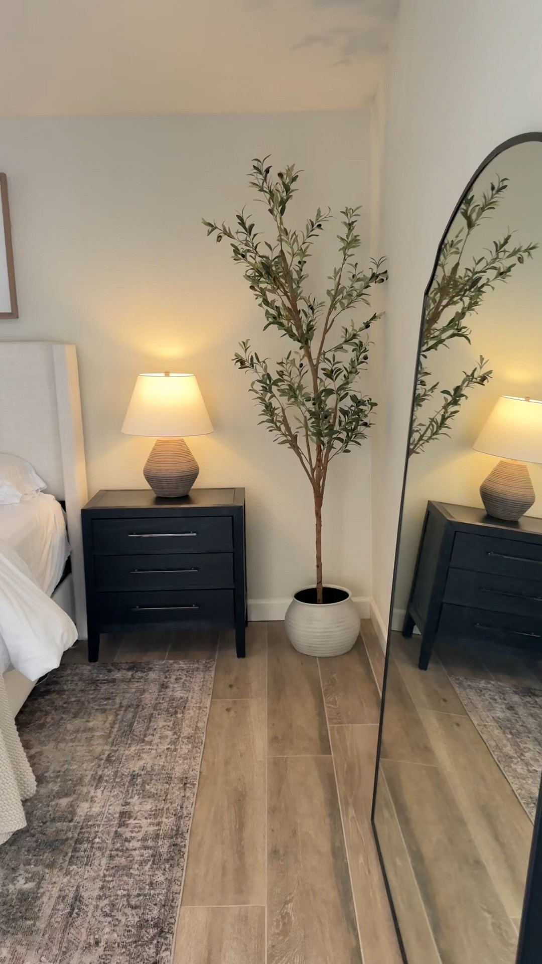 Neutral bedroom decor inspo! 
Loving this corner of our primary bedroom 🤩 

Code HALEYK will save you 15% at TWOPAGES!

•••
Master bedroom, bedroom decor, bedroom design, neutral rug, Loloi rug, large mirror, floor mirror, oversized mirror, Olive tree, faux tree, black nightstands, black wood nightstand, lamps, table lamp, bedroom lamp, stone lamp, king bed, king bedding, linen bed, upholstered bed, wingback bed 


#LTKStyleTip #LTKWatchNow #LTKHome