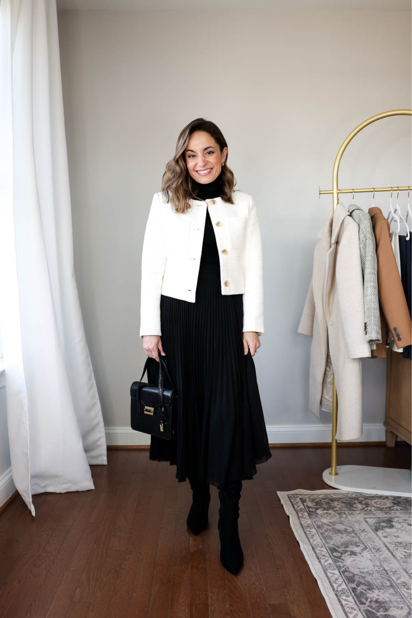 Winter workwear capsule series: black pleated skirt outfits

This capsule has 16 pieces (not including shoes and bags) and 30 outfits! 

Black turtleneck (aritzia): xs 
Cropped jacket (banana republic factory): petite xxs 
Black skirt (aritzia): xs 
Also linking a similar skirt from Amazon - I wear that skirt in small, link shows a green skirt, it also comes in black

My measurements for reference: 4’10” 105lbs bust, waist, hips 32”, 24”, 35” size 5 shoe. 25” inseam measurement to my ankle bone.

#LTKWorkwear #LTKStyleTip