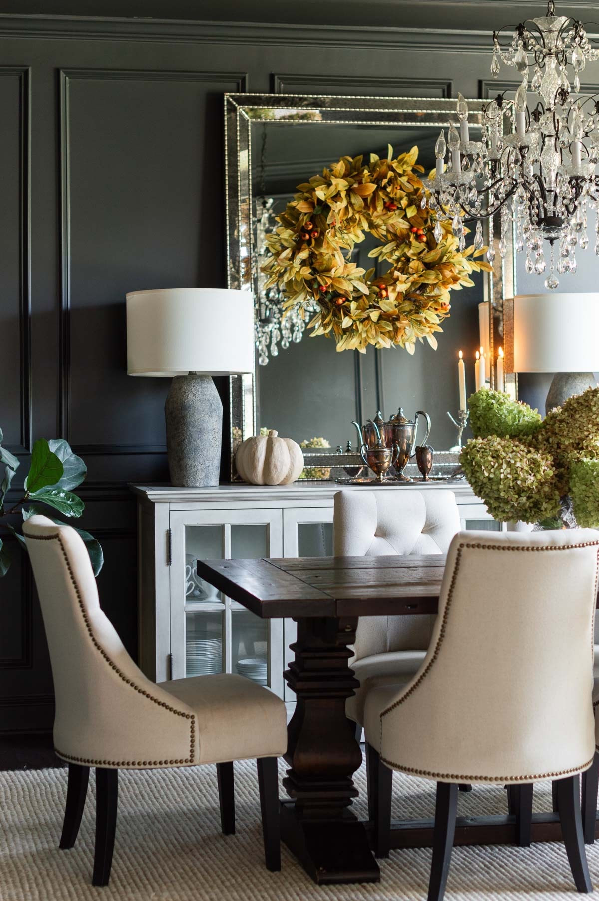 My dining room mirror is the perfect frame for a seasonal wreath, like this fall foliage and berry pod fall wreath. Limelight hydrangeas also make the ideal arrangement, and as a tip, they will dry naturally. home decor dining room decor fall decor cement lamps jute rug

#LTKHome #LTKStyleTip #LTKSeasonal