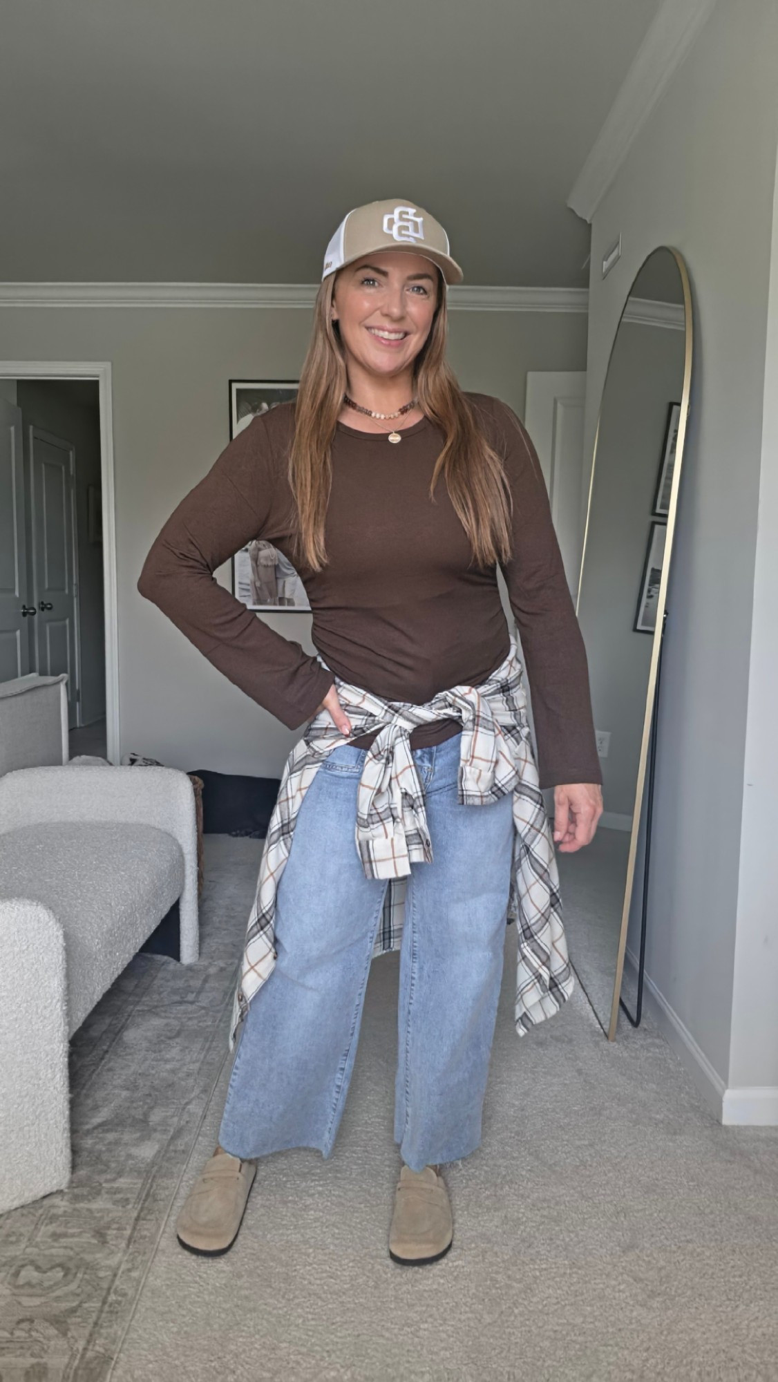 Casual fall style with a little flair! This chocolate brown ribbed top from ZESICA features a flattering scoop neckline and fun bell sleeves. Styled with wide-leg denim, a plaid shirt around the waist, and cozy clogs for an easy, laid-back everyday look!

#LTKSeasonal #LTKootd #LTKMidsize