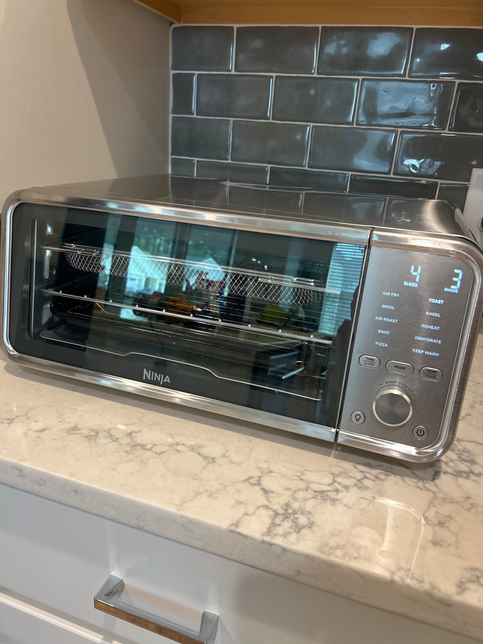 If you’re in the market for a new toaster- this one is sleek, compact and has air fryer settings as well! 