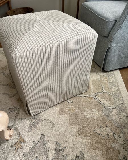 My favorite living room ottoman is back in stock and on sale! I love it so much I bought another one for my bedroom sitting area! Goes with everything with linen look stripes.

#LTKhome #LTKsalealert