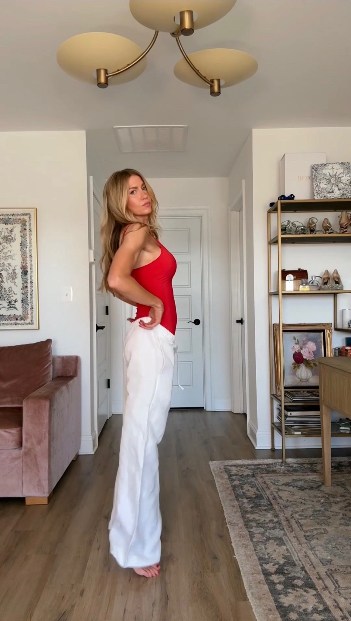 Styling the viral red one piece swimsuit with linen pants! 

#LTKgrwm #LTKootd #LTKSeasonal