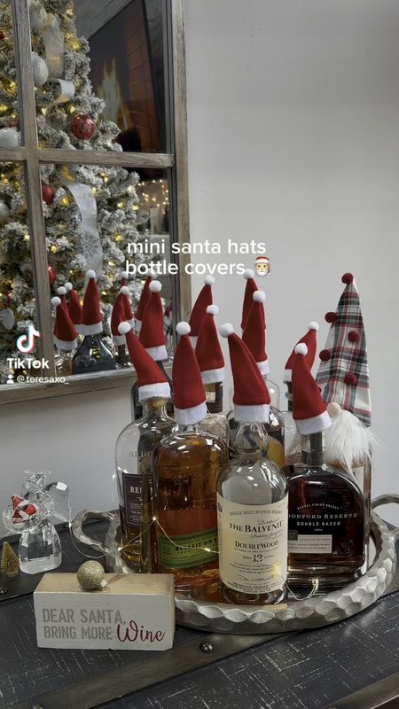 Mini Santa hats bottle covers 

#LTKparties #LTKHoliday #LTKGiftGuide