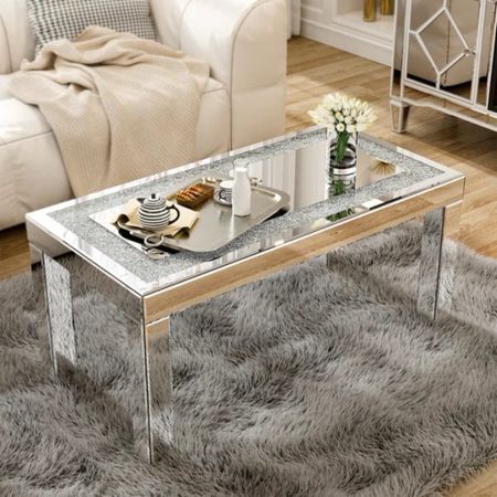 Shop coffee tables! The Merrissa Mirrored Coffee Table with Mirror Crystal Board is under $350.

Keywords: Coffee table, dining room, living room 

#LTKsalealert #LTKhome #LTKSeasonal
