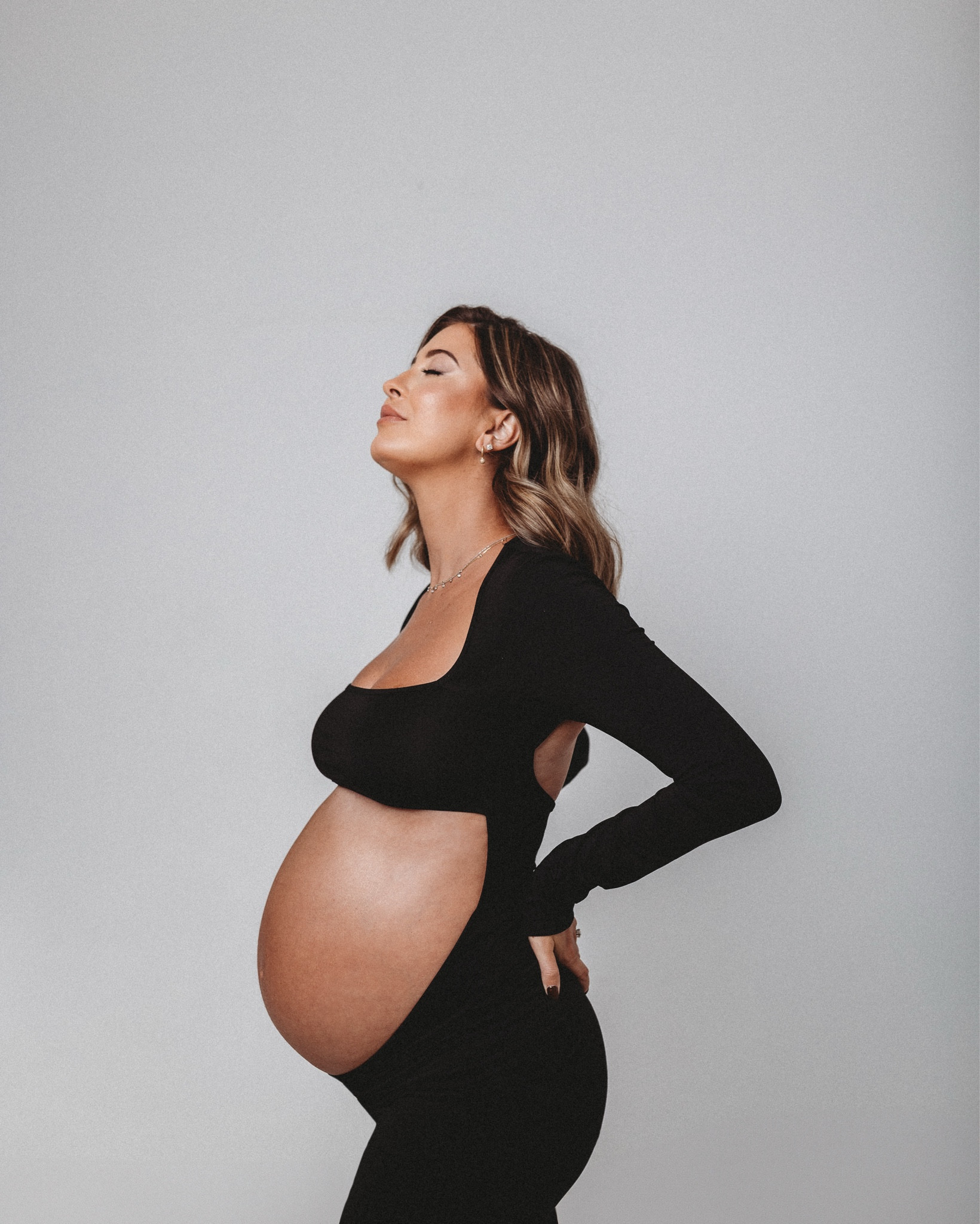 Bump photo shoot studio shoot pregnant black long sleeve dress 

#LTKBump #LTKBaby #LTKFindsUnder50