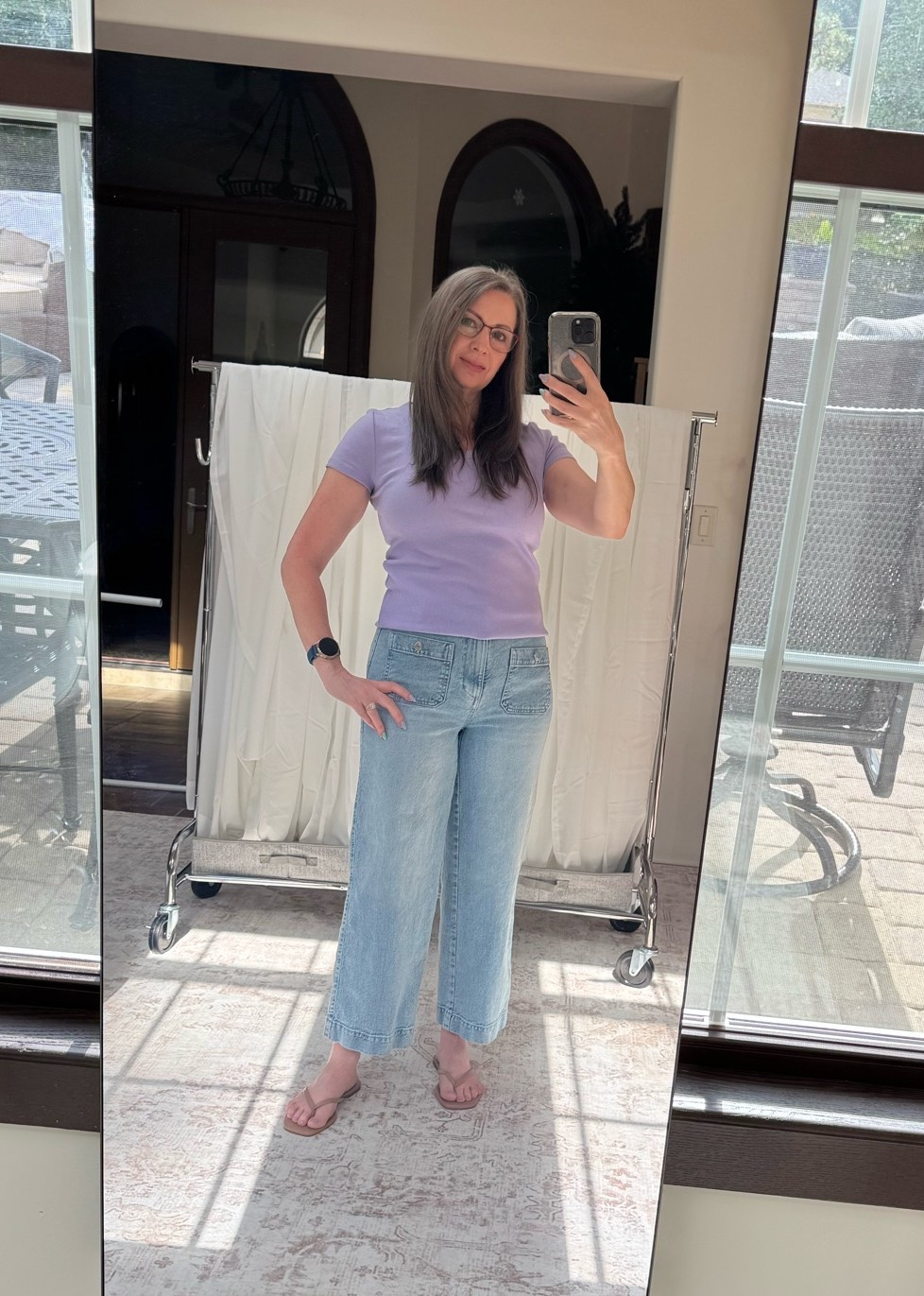 Embrace the beach vibes with the current trending summer colors in lilac and light blue. This scoopneck ribbed T-shirt from Talbots is my absolute favorite staple in my wardrobe—I've got it in so many colors! It always fits perfectly and radiates that perfect summer vibe. Just add a comfy pair of flip-flops to keep that relaxed feel. I’m wearing a petite small. Also, light wash cropped wide-leg jeans are right on trend and give off that fresh summer look. Remember to pair them with flip-flops to keep the style easygoing and fun. I'm wearing a regular size 4. 
Flip flops in size 7, I'm
Normally a 7 1/2.

#LTKootd #LTKOver40 #LTKTravel