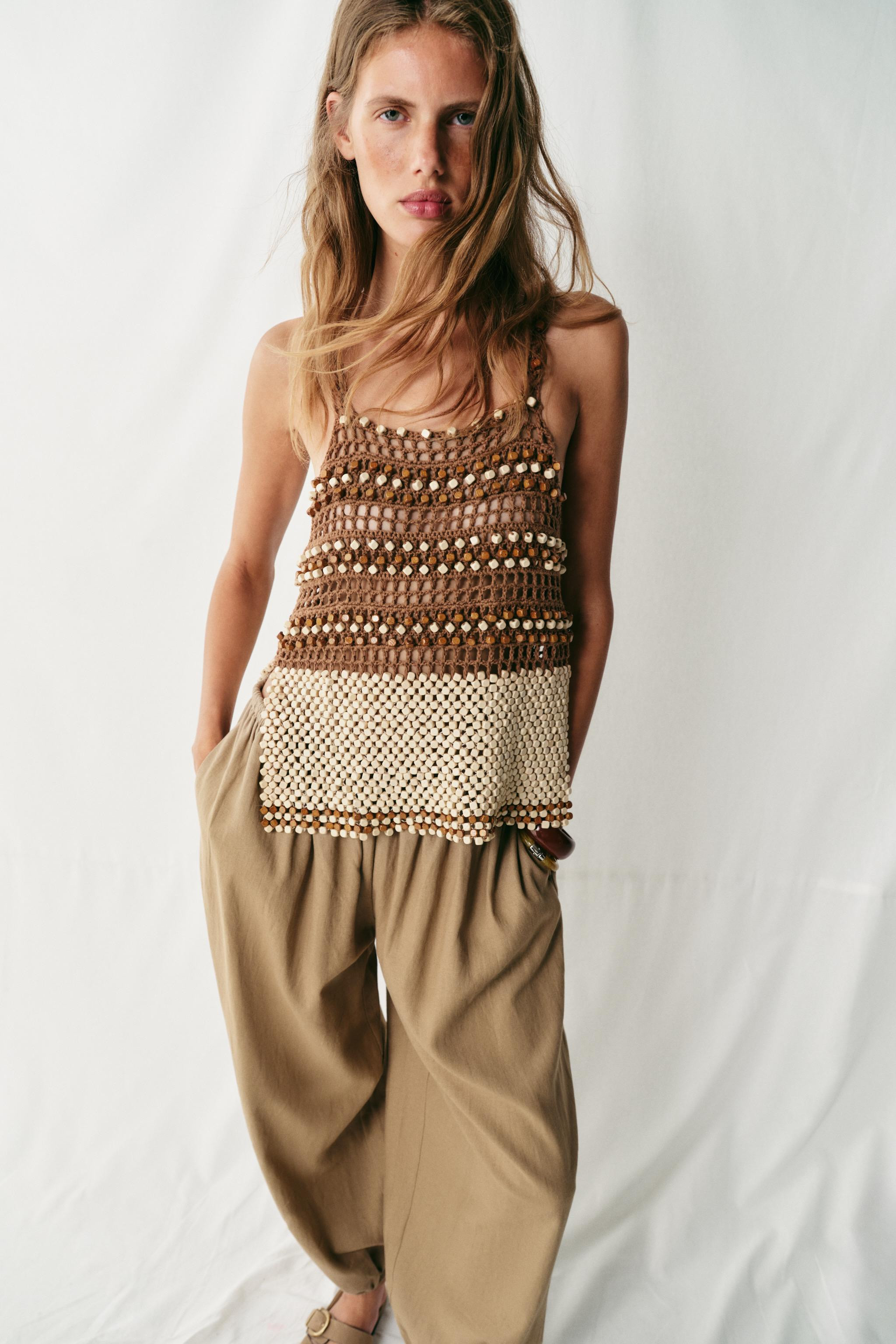Pants made of linen. Mid-rise with elastic waistband and front pockets. Balloon leg finished with... | Zara US