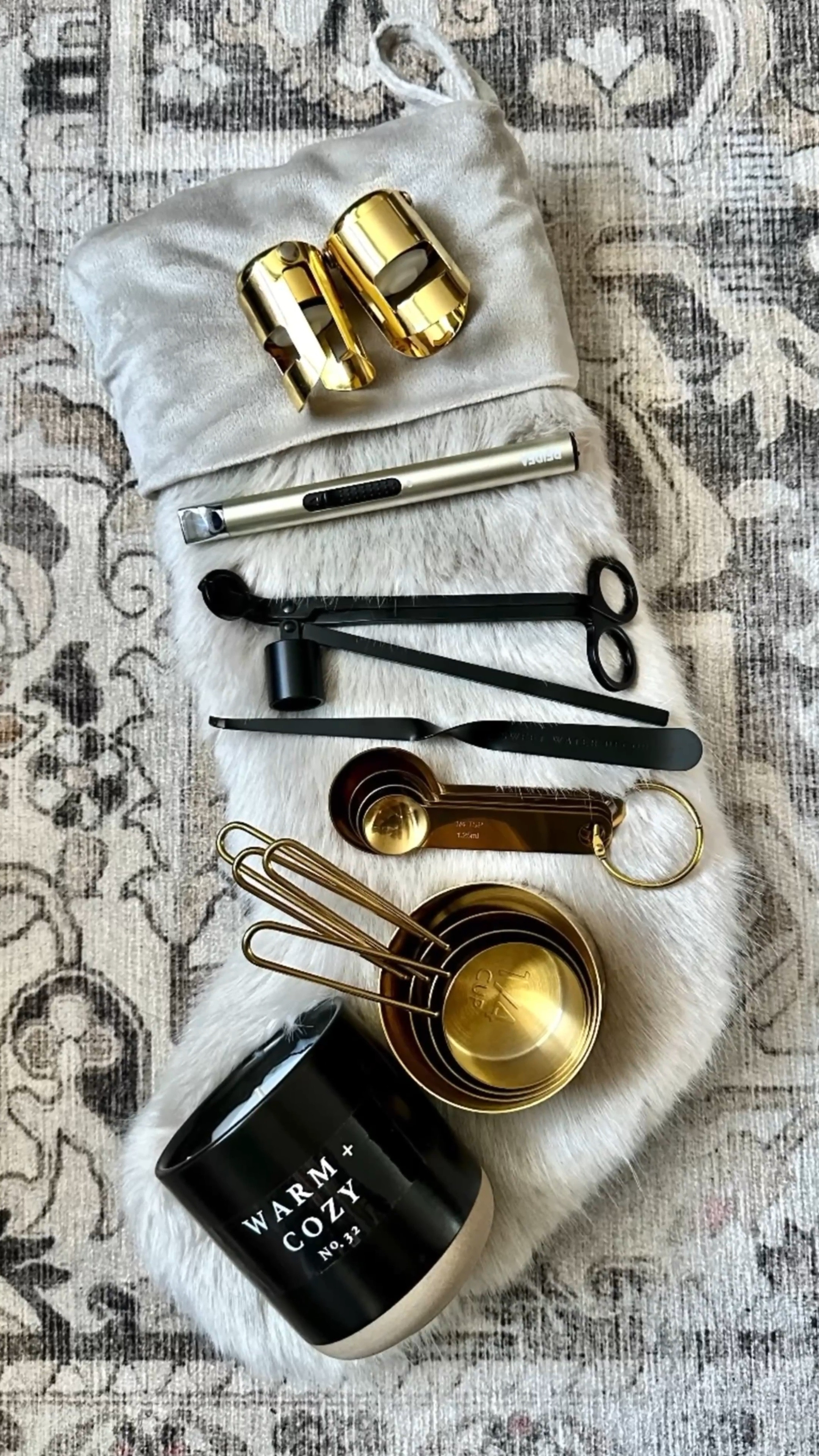 Last minute stocking stuffer gift ideas, fur stocking, gold champagne stoppers, cozy candle, candle accessories, electronic lighter, gold measuring cups, Ruggable rug, gifts for her, hostess gifts 

#LTKfindsunder50 #LTKHoliday #LTKGiftGuide