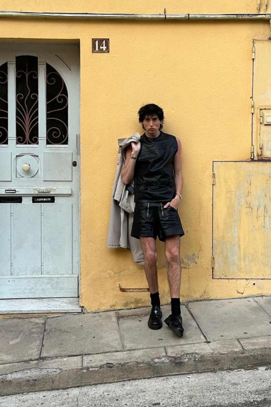 look total noir ensemble en cuir noir Prada short et top débardeur en cuir chaussettes hautes 

#LTKFind #LTKstyletip #LTKmens