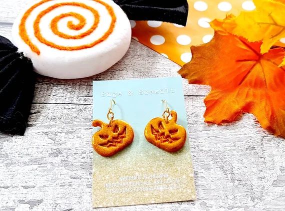 Read the full title
    Copper Glitter Pumpkin Dangle Earrings ~ Autumn Fall ~ Halloween Fashion | Etsy (UK)
