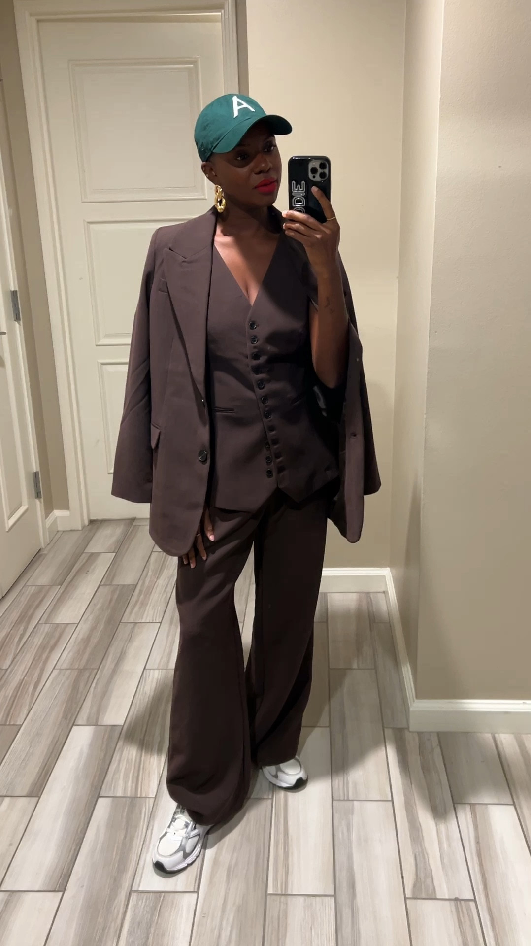 Brandy’s Day 3 LTK CON outfit! Chocolate brown blazer, pants and vest with new balance 408 sneaker, blue red matte lipstick and green Aritzia baseball hat  

#LTKVideo #LTKCon #LTKWorkwear