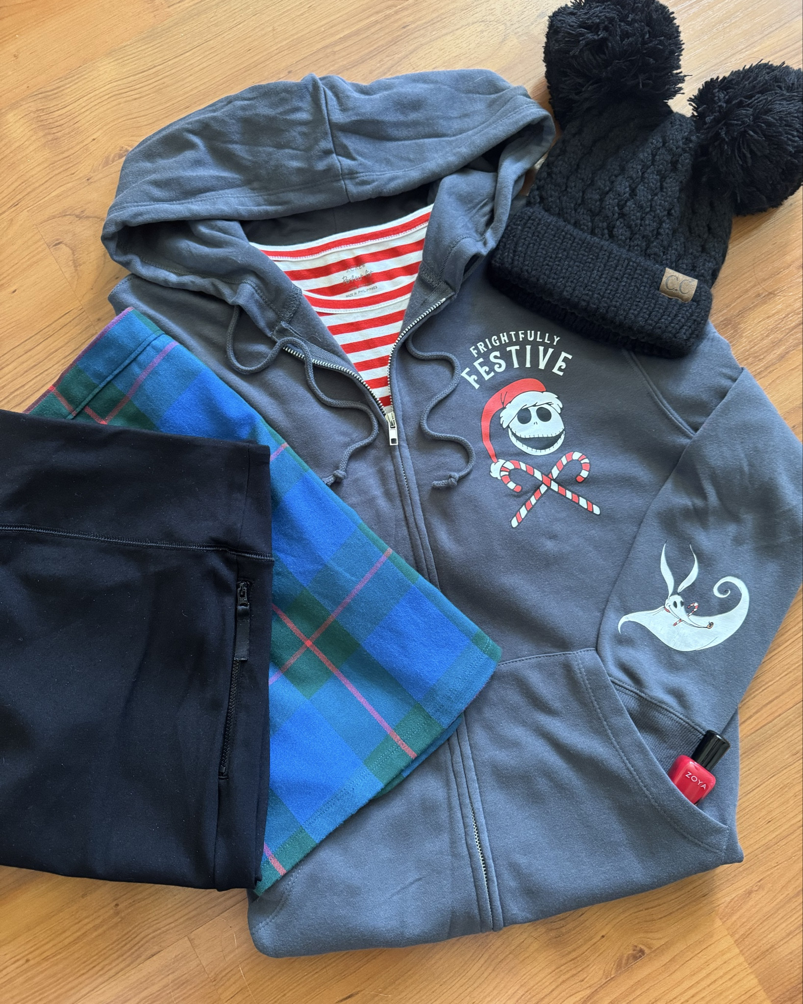 Combining a love for Halloween, Christmas, and Jack Skelliington! Zipper hoodies are great for layering and work with any bottoms! #nightmarebeforechristmas #Halloween #Christmas #disney #sweatshirt #fall 

#LTKFindsUnder50 #LTKSeasonal #LTKTravel