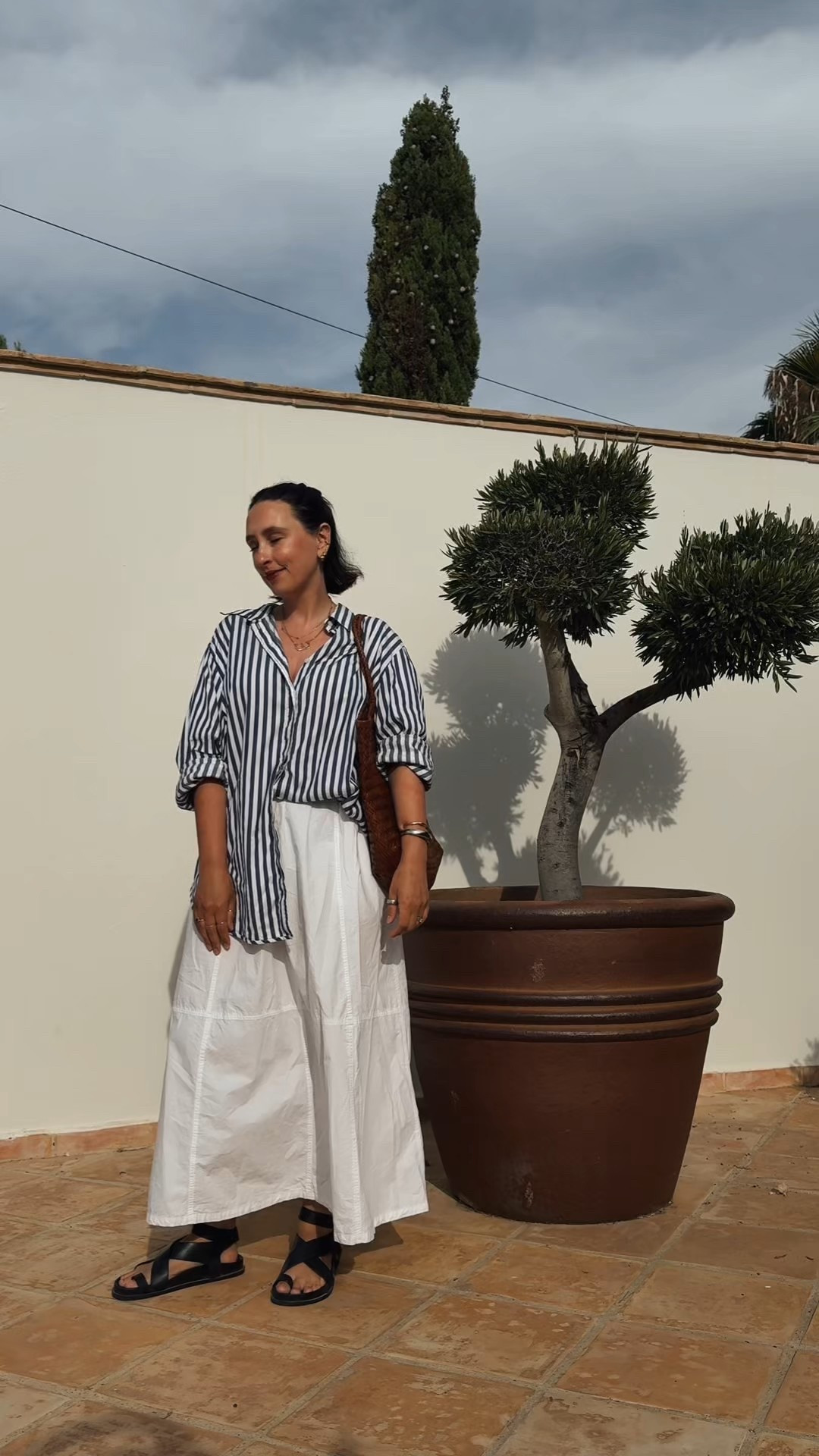 Midsize over 40 summer outfit idea.

Oversize stripe shirt - cos
Skirt - Topshop
Shoes - a.emery
Bag - Anthropologie 

#LTKuk #LTKmidsize #LTKsummer