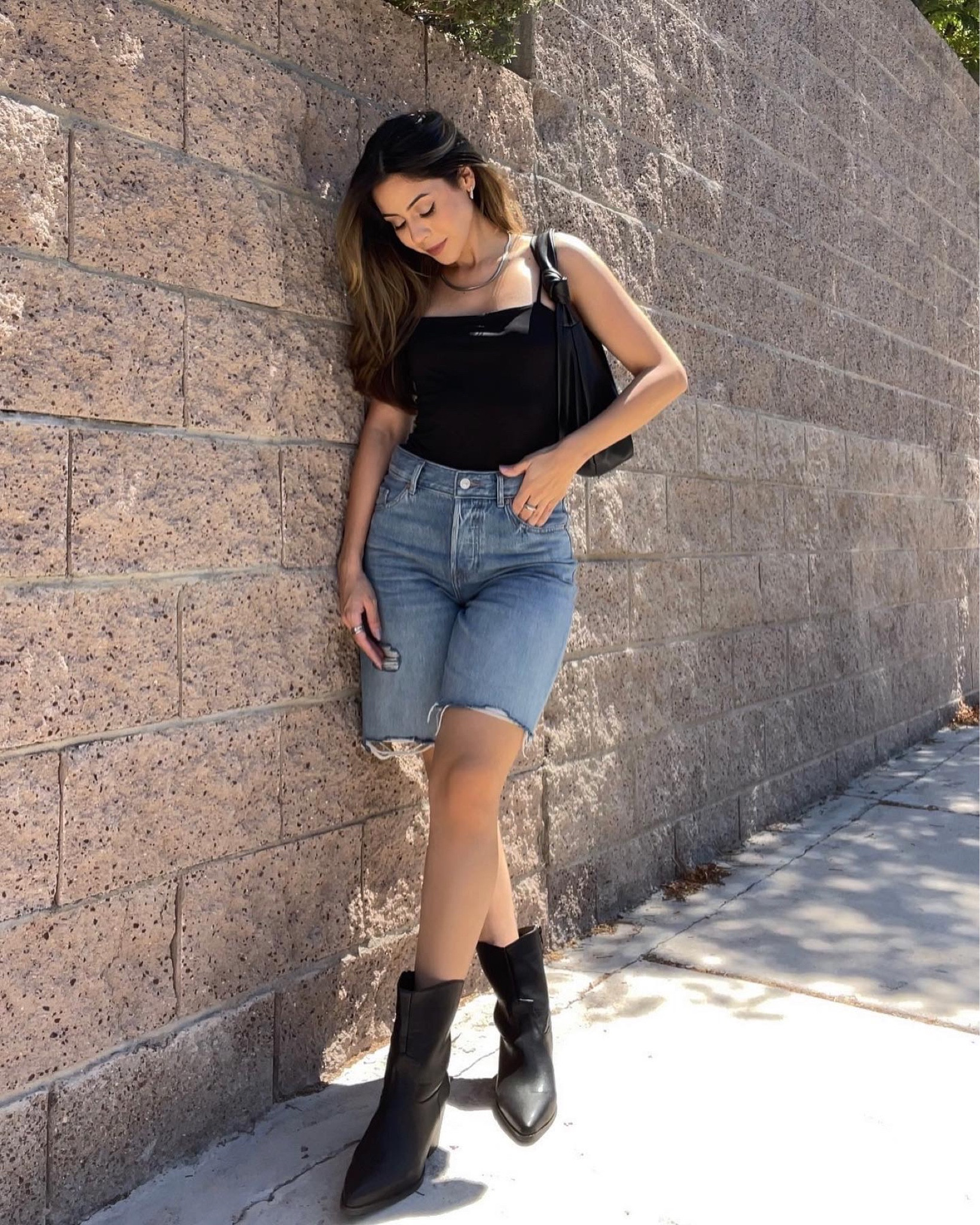 Minimal Street wear outfit wearing a black bodysuit, Bermuda shorts and western boots 

#LTKstyletip #LTKfit #LTKunder50