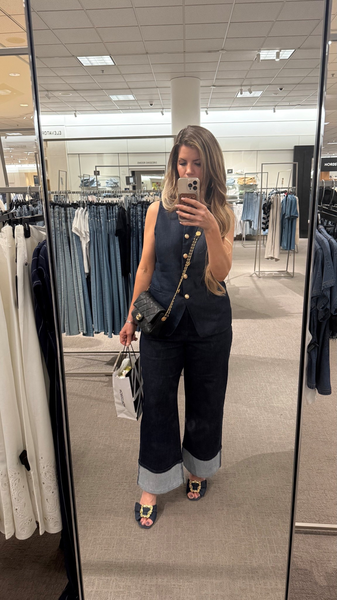 
Denim on Denim, But Make It Elevated
Obsessed with this structured sleeveless denim vest + wide-leg cuffed jeans combo! Gold buttons and a luxe chain crossbody add polish, while the statement bow sandals with gold detail keep it fun. Perfect for brunch, shopping days, or casual Fridays with a twist.

#kohls 
#DenimOnDenim #WideLegJeans #ChicCasualStyle #NordstromStyle #LTKUnder100 #LTKSpringStyle #WeekendOutfit #ElevatedBasics #StatementShoes #OOTD #SpringFashionFinds 