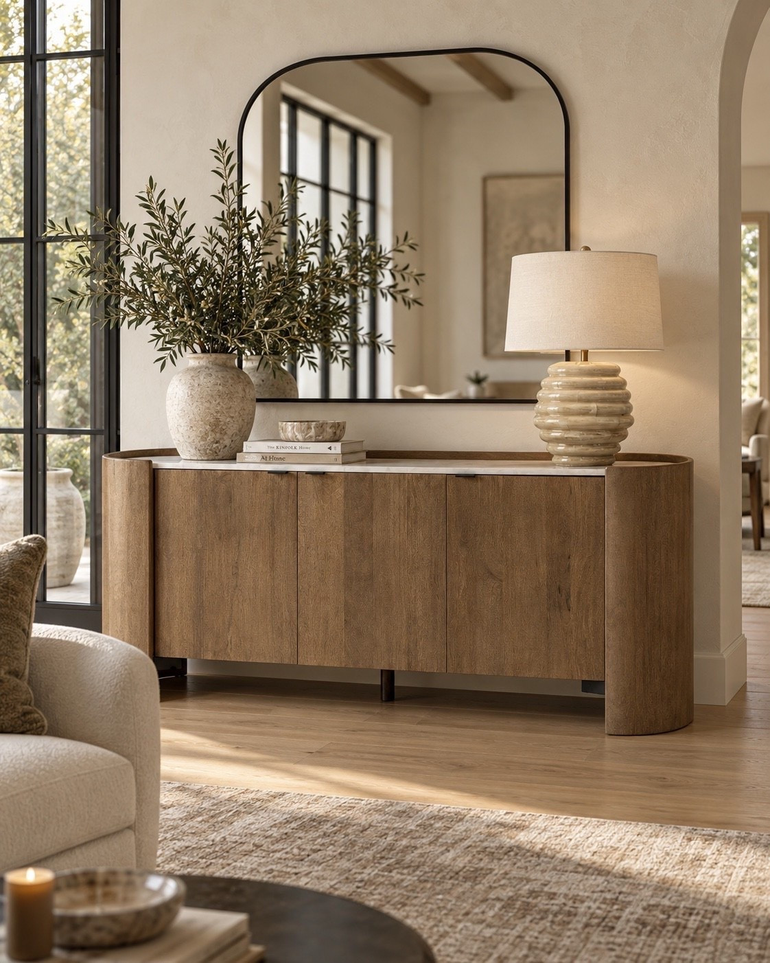 I love this elevated sideboard! The wood finish paired with the rounded style and contrasting top make this piece appear high-end and truly designer worthy. I love the functionality of sideboards such as these—perfect for all stages of life!

#LTKHome