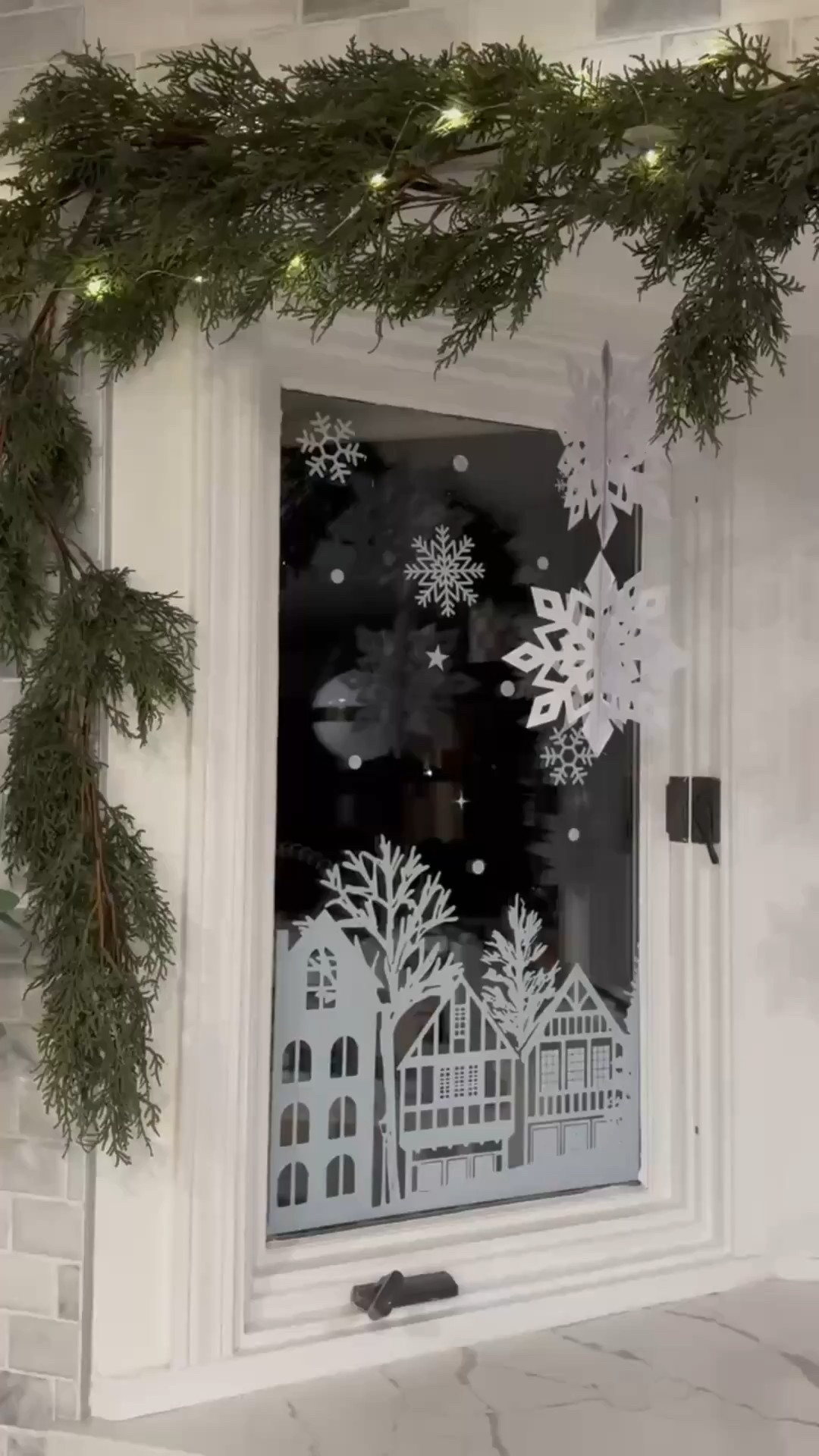 Turning the kitchen nook into a cozy winter wonderland with hanging paper snowflakes, a full set of white Christmas village window clings, and a lush lighted cedar garland draped across the window. The magic hits every time the sunlight glows through those little houses.
#eanesinteriors #christmaswindowdecor #holidaykitchen #winterwonderland #christmasgarland #snowflakedecor #holidayhome


#LTKSeasonal #LTKHoliday #LTKHome