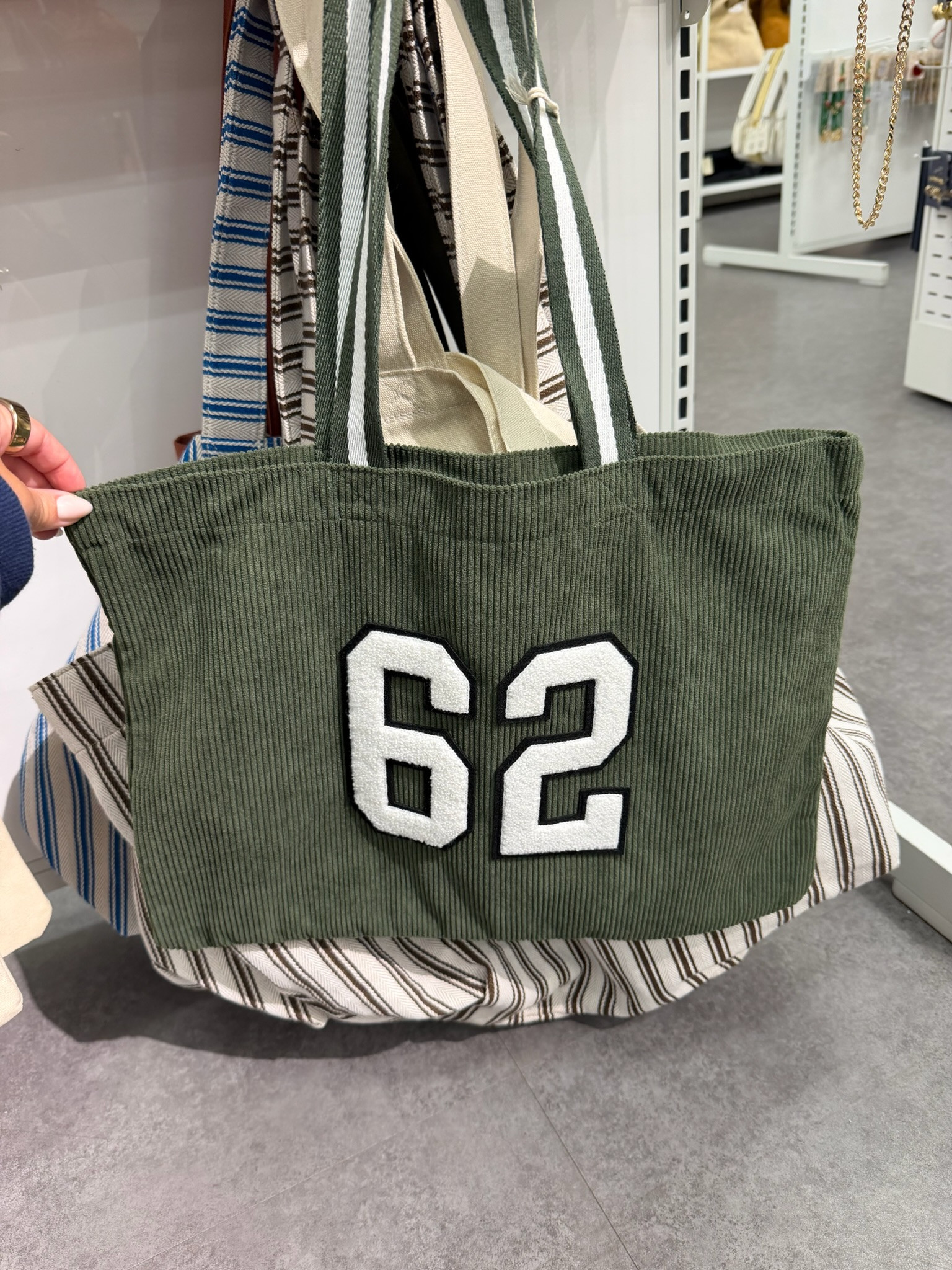 This $15 corduroy tote is such a cute fall and back-to-school find 🍂 The oversized collegiate design is perfect for carrying books, work essentials, or everything you need for game day!
wedding guest dress summer, country concert outfits, teacher outfits, back to school outfits, summer outfits over 40, date night outfits, vacation outfits beach, summer dresses, business casual workwear, concert outfit ideas 

 #LTKgrwm #LTKootd #LTKSeasonal
