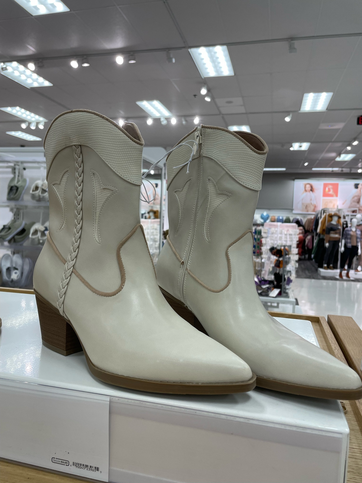 Universal Thread cowboy boots in an ankle height
2in block heel with a closed-toe design
Pull-on style with zipper closure
 textured outsole
Memory foam insole

#LTKSeasonal #LTKshoecrush #LTKstyletip