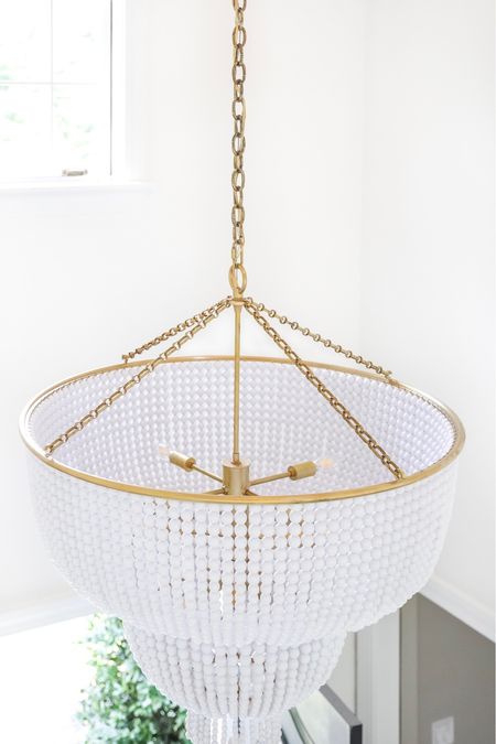 The entryway— the first spot where guests will get a feel for the tone of your home.

We love making a statement with fabulous lighting—the bigger the better. Here we used the AERIN Jacqueline chandelier by Visual Comfort and it’s a show stopper. Shop the look and follow @pennyandpearldesign for more interior design and home style ✨