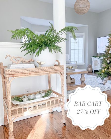 My bar cart is more than 25% off with FREE shipping through Cyber Monday!! Use as a bar cart for holiday entertaining, or as a small console table! 
- 
Serena & Lily bar cart, woven bar cart, rattan bar cart, bar cart on sale, christmas bar cart, holiday bar cart, christmas decor, large white vase, living room rug, blue and white rug, 8x10 rug, greenery, coastal coffee table books, woven tree collar, christmas tree collar, driftwood, amazon coffee table books, neutral coffee table books, bar cart decor, white dough bowl, Norfolk pine branches, afloral Norfolk pine, bar cart on sale, Serena & Lily Black Friday Sale 

#LTKHoliday #LTKhome #LTKsalealert