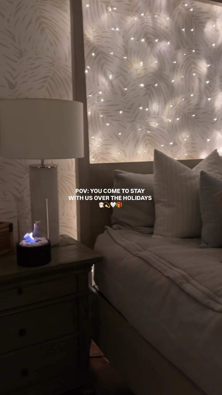 Make your guest room so cozy for your holiday guests with these Christmas decorations. Curtain fairy lights and tabletop fire pit are from Amazon. #founditonamazon

#LTKHome #LTKHoliday