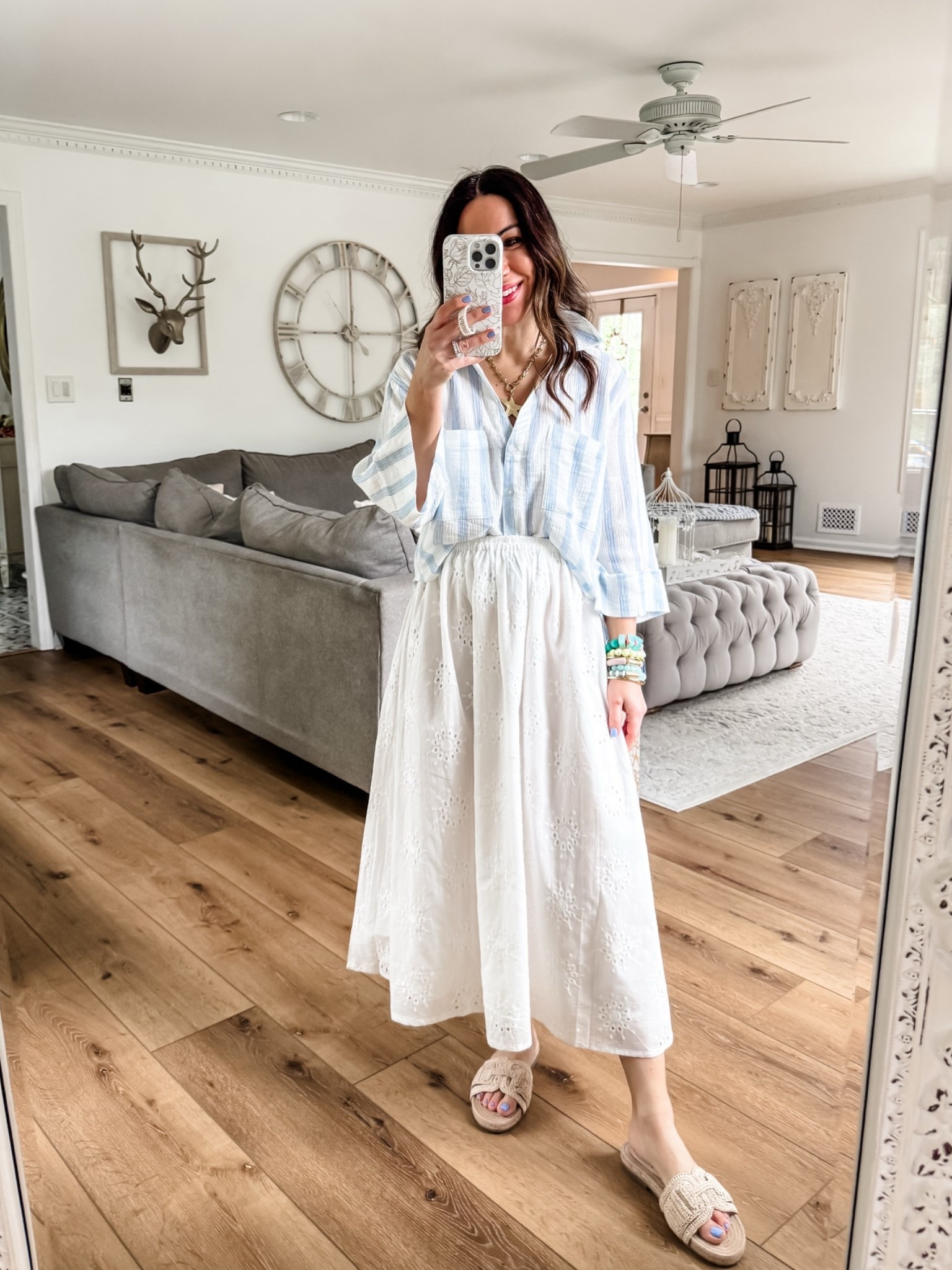 Small gauze, button-down shirt. Small white skirt. Sandals TTS.

#LTKOver40