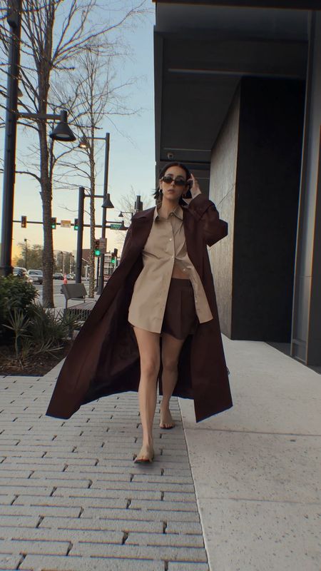 Outfit Details:

Trench Coat: Aligne (MODEETCHIEN-20 for $ off)
Shirt: SoldOut NYC (NAT15 for $ off)
Shorts: Tibi
Mesh Sandals: The Row
Bag and Sunnies: Vintage
Hoop Earrings: Ring Concierge 

Size down 1 size in trench, I’m wearing xs in the shirt 

#LTKshoecrush #LTKSeasonal #LTKstyletip