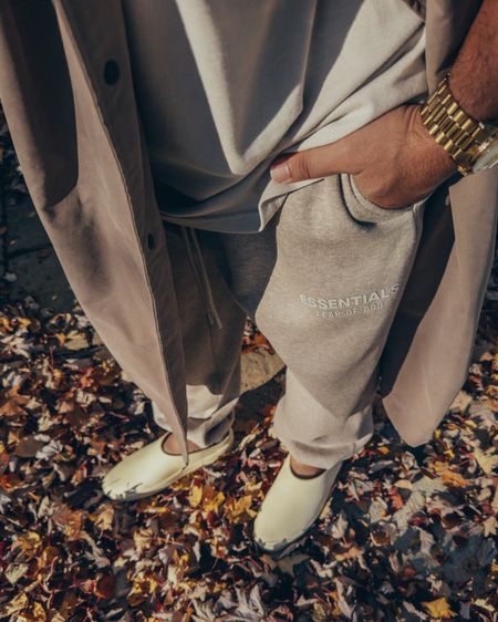 ESSENTIALS Sweatpants in ‘Core Heather’ (size M) and Long Coat in ‘Wood’ (size M). FEAR OF GOD California 1.0 slides in ‘Cream’ (size 41). A relaxed and elevated look for Fall that’s great for grabbing coffee or running errands. 

#LTKstyletip #LTKmens