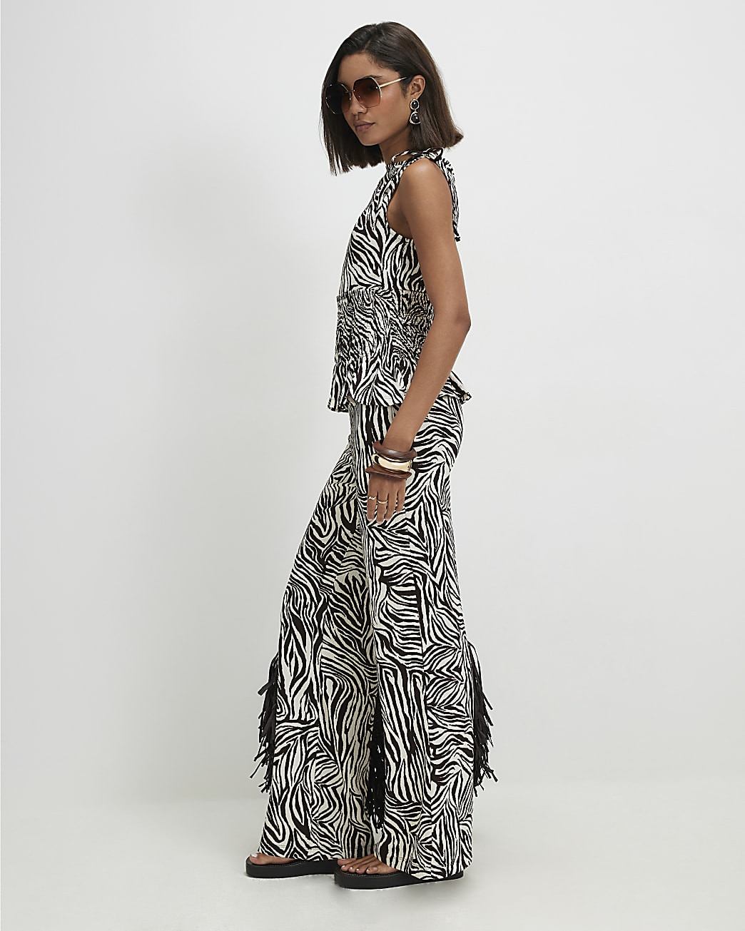Brown Zebra Print Wide Leg Trousers | River Island UK & IE