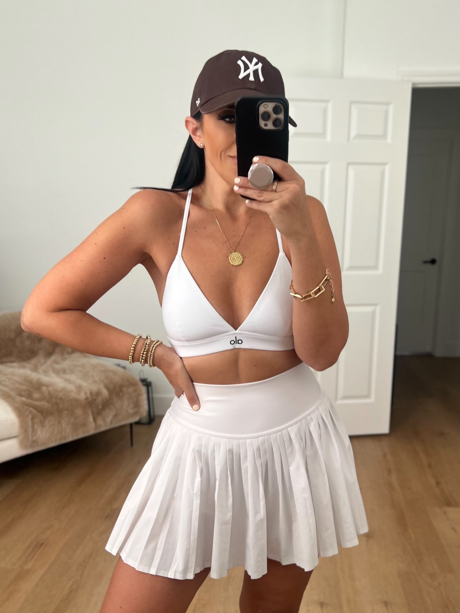 Splendor Bra is wearing a size medium. Grand Slam Tennis Skirt wearing size medium. 
