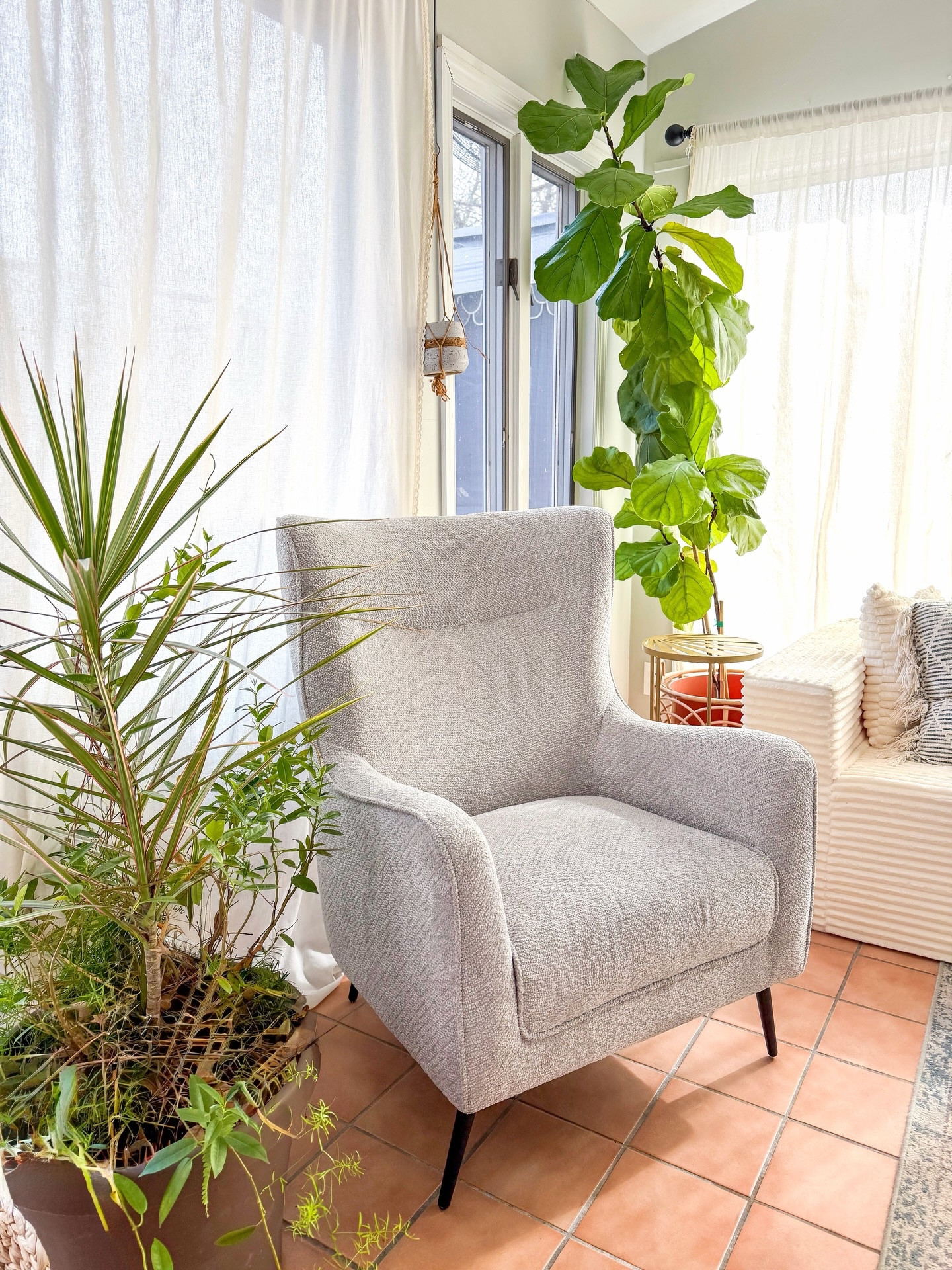 We’ve been moving so many furniture pieces around and getting many new items to spruce up our space. 
I love the tall back of this chair, the material is soft and great quality and it looks so nice in our sunroom.



#LTKdayinmylife #LTKSaleAlert #LTKHome