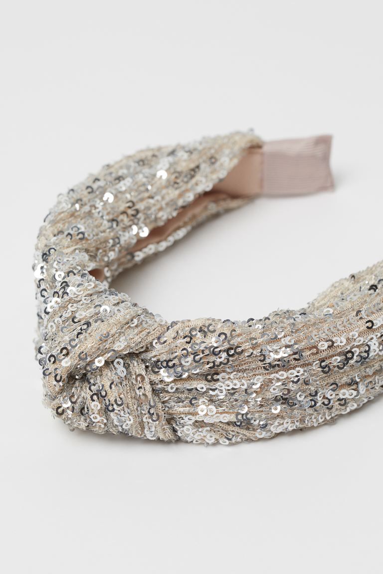 Hairband covered in sequined mesh with a decorative knot detail at top.
	Weight0.05 KGComposition... | H&M (US + CA)