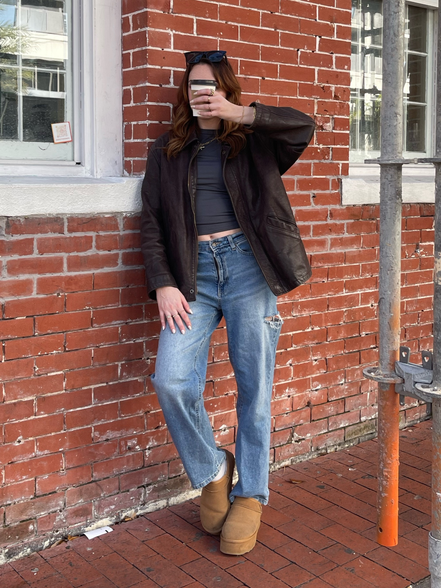 Fall/winter streetwear outfit. Baggy brown leather jacket with grey cropped t shirt and baggy jeans with platform ugh  

#LTKFindsUnder100 #LTKFindsUnder50 #LTKSeasonal