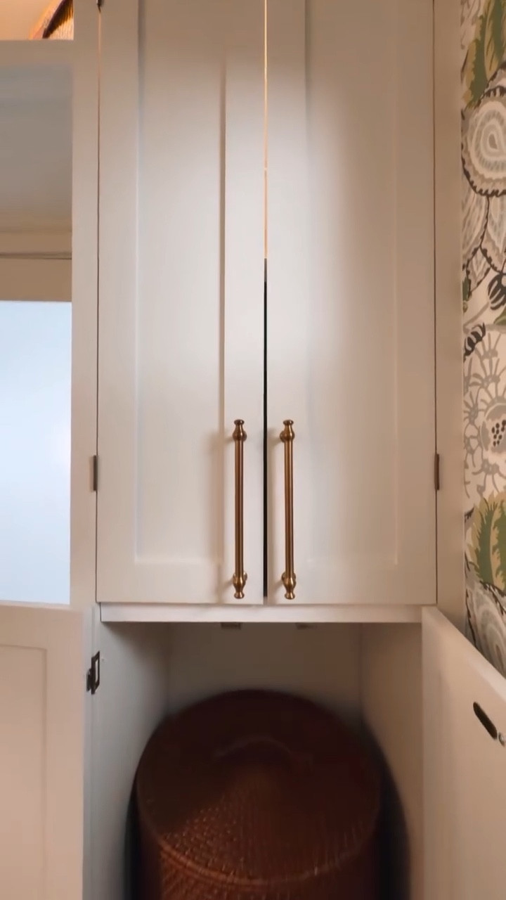 It’s finished. Fully finished.

This used to be a hallway. Now it’s a closet makeover that completely changed how this part of our home works.

The pieces from @Rejuvenation are what brought it all together. The hardware, the lighting, the switch plate, the storage baskets, even the laundry hamper. Those details elevated the space in a way that feels intentional but not overdone. The brass adds warmth, the scale feels right, and the natural materials balance out all the pattern.

I chose the ceiling wallpaper first and built the direction from there. The wall wallpaper came along later, unexpectedly, and once I saw them together I knew it was right. I pulled the woodwork paint color straight from the background of the ceiling pattern so everything would connect without fighting each other.

From there it was trim work, built-in storage, and making sure the layout actually functions as a real dressing space. Not just something pretty, but something practical.

Hallway to closet transformation complete.

If you’re into closet design, wallpapered ceilings, custom millwork, brass hardware, and small space renovation ideas, this one is for you. #RejuvenationPartner #ProjectCollective #Sponsored