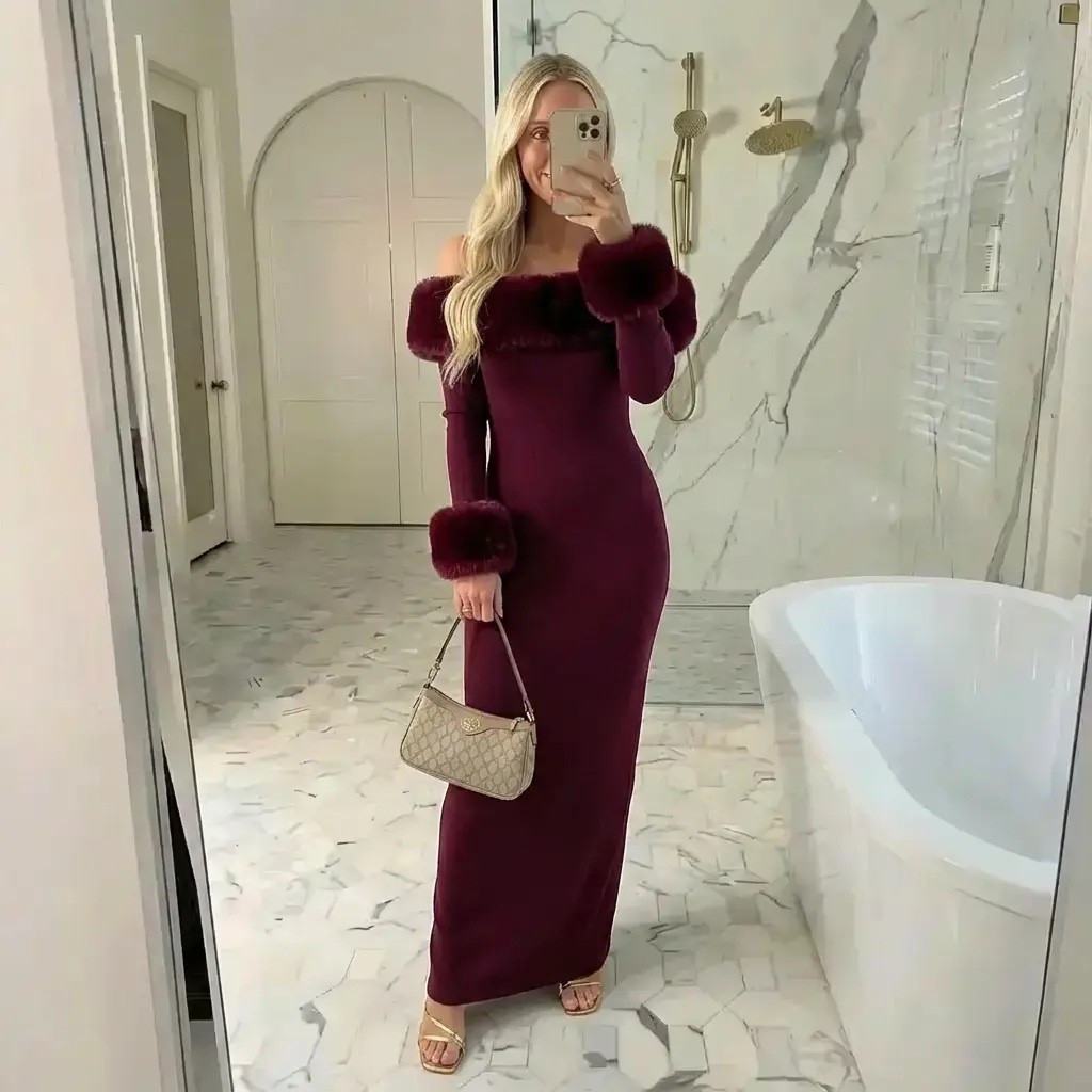 A luxurious mirror selfie in a bright marble bathroom with soft natural lighting. A tall, elegant blonde woman wears a deep burgundy off-the-shoulder floor-length dress with plush fur-trimmed cuffs and neckline, creating a refined winter-glam silhouette. She carries a small beige designer shoulder bag and wears delicate neutral-toned heels. Her hair is styled in loose, polished waves, and the overall aesthetic feels timeless, feminine, and high-end — evoking quiet luxury, old-money elegance, and understated confidence.

⸻

HASHTAGS

#QuietLuxury
#OldMoneyAesthetic
#WinterGlam
#BurgundyDress
#ElegantStyle
#LuxuryAesthetic
#TimelessFashion
#SoftGlam
#FeminineEnergy
#MirrorStyle
#ClassicElegance
#EveningLook
#ModernRomantic
#ChicMinimalism
#LuxuryVibes
#EffortlessChic
#StatementDress
#OOTD
#NeutralLuxury
#MainCharacterEnergy

#LTKHoliday #LTKGiftGuide #LTKdayinmylife