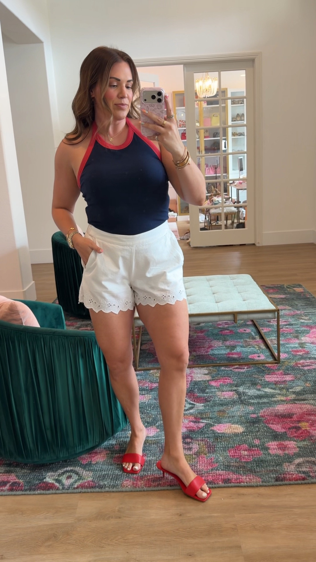 curvy midsize 4th of July red white and blue outfit! wearing size medium in navy with red trim halter top and size medium in eyelet trim white shorts ❤️🤍💙  outfit on sale!

#LTKSeasonal #LTKMidsize #LTKSaleAlert